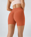 SoftlyZero™ Plush High Waisted Crossover Ruched Yoga Shorts 5'' - Orange Rust